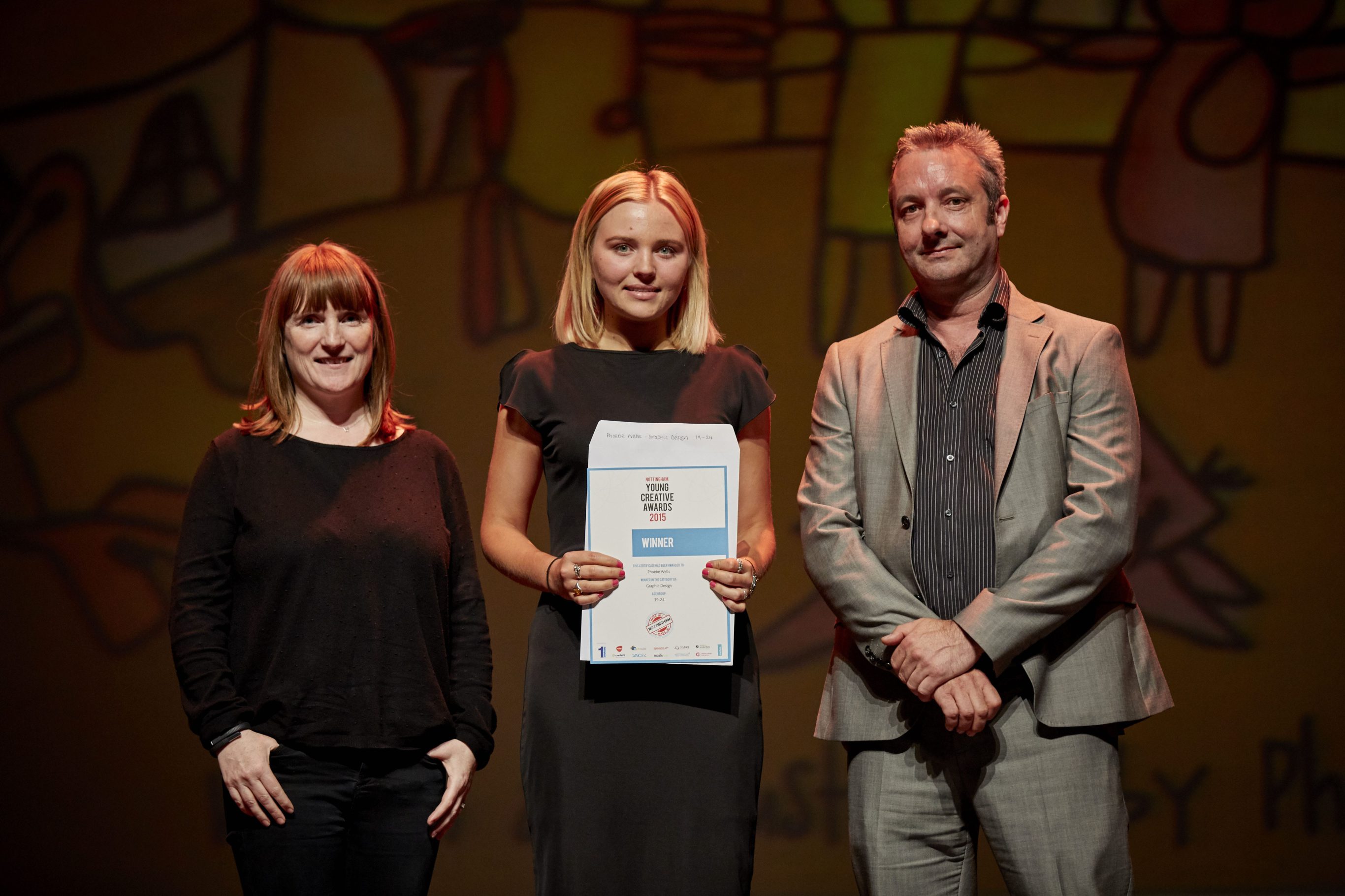 Nottingham Young Creative Awards 2015. Phoebe Wells being presented with winners certificate for Graphic Design category.