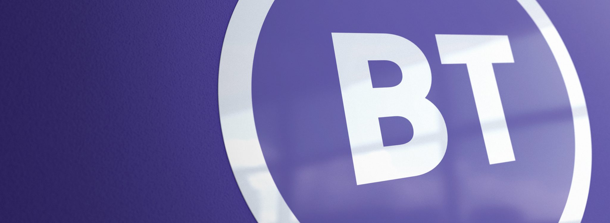 BT Logo on purple internal wall — BT Branded Environments