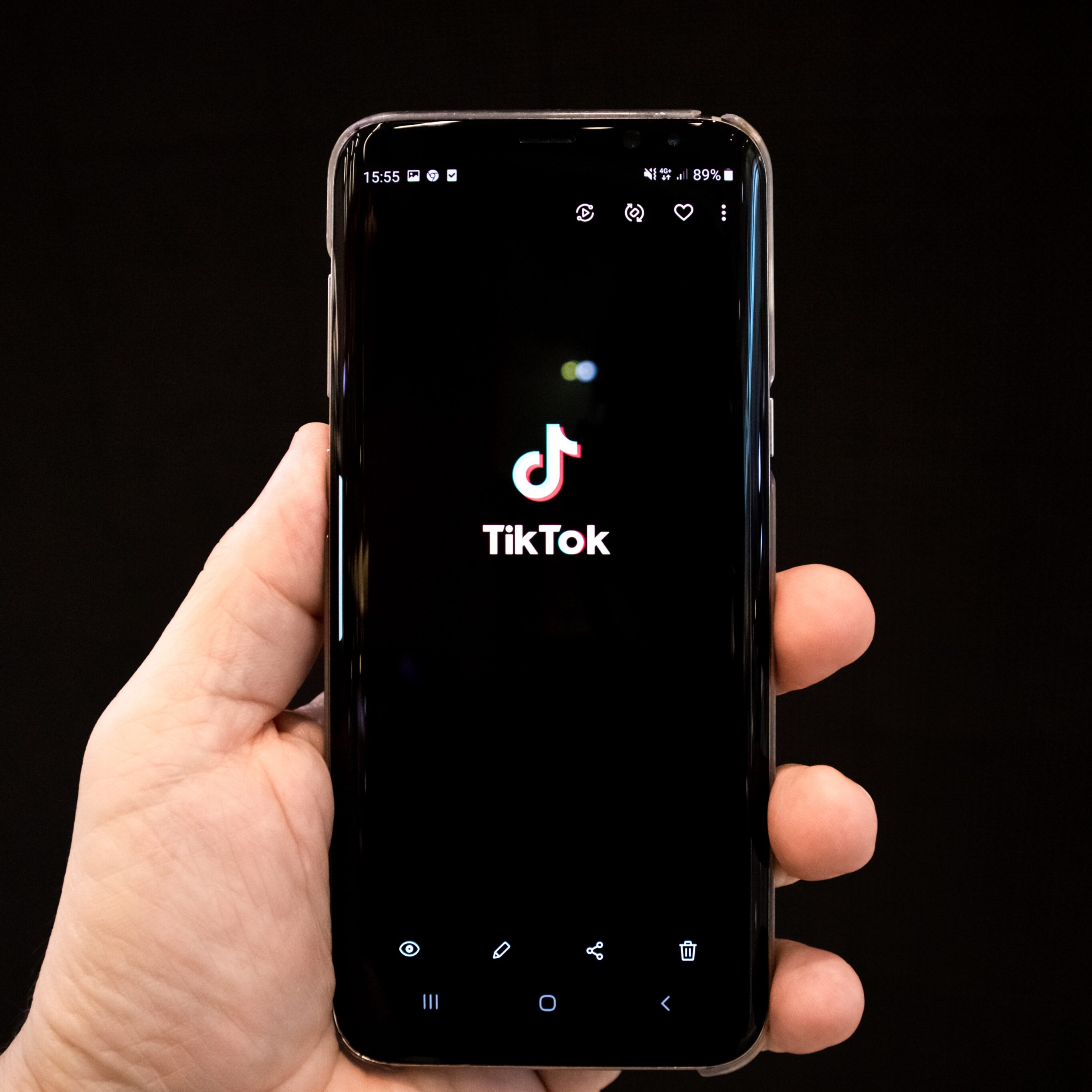 mobile phone showing tik tok logo